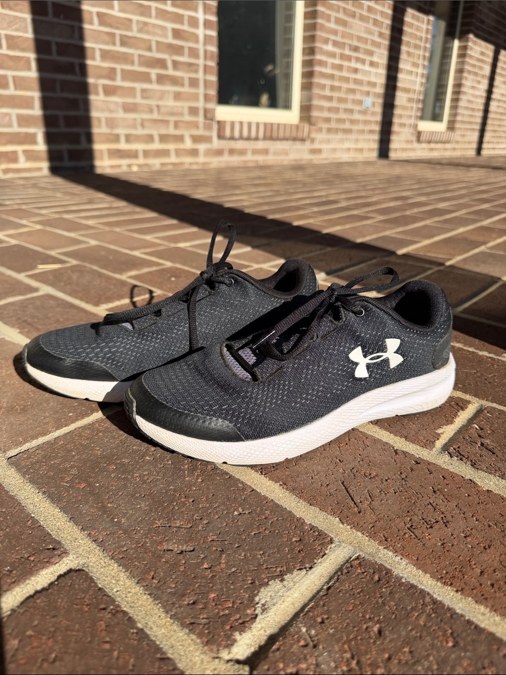 Under Armour Women’s Black Athletic Shoes with White Soles